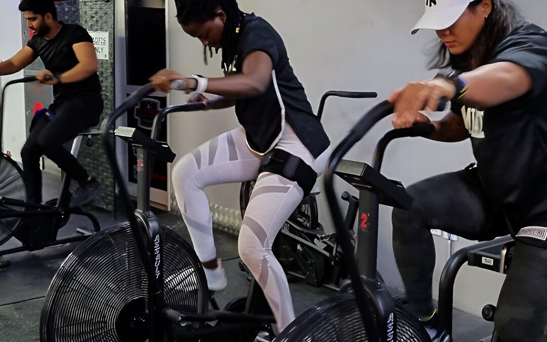 Effects of Blood Flow Restriction Training and Traditional Resistance Training on 1RM Squat and Vertical Jump Performance Following a 4-Week Intervention in Well-Trained Males